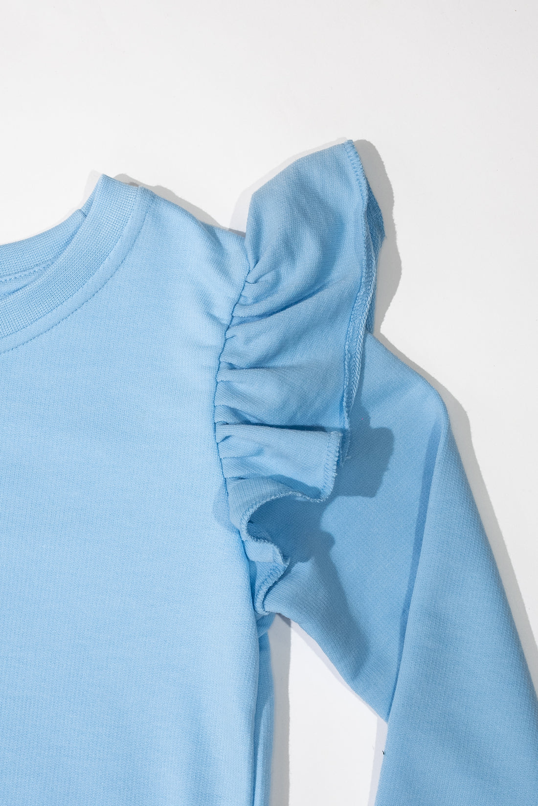 Sky Ruffled Shoulder Top