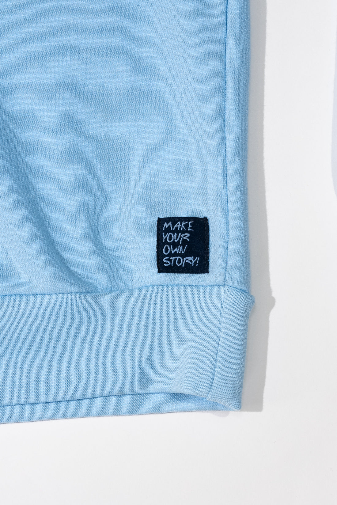 Sky Ruffled Shoulder Top